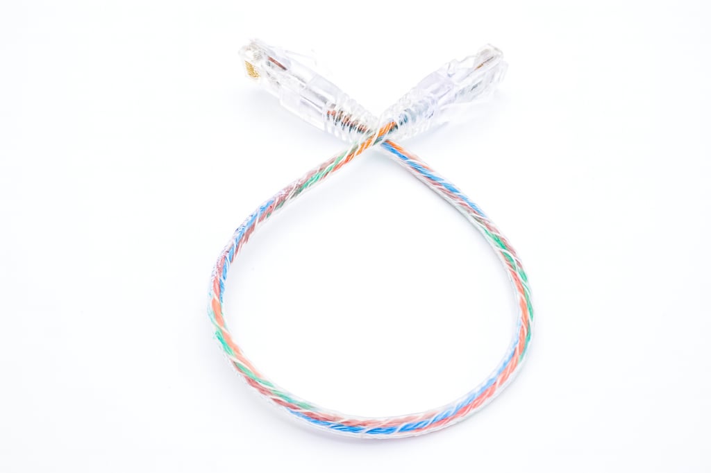 Product Marketing image of the Grid Networking SKU POEJK6A-150-CL - 15 ft Slim Cat6A 10G Patch Cable - Clear, 28AWG UTP, High-Flex Snagless Patch Lead | POEJK6A-150-CL