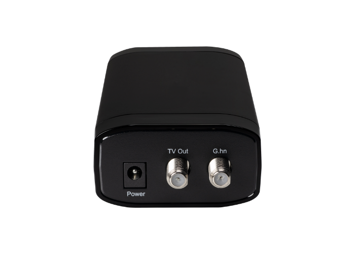 Close-up of the Comtrend GCA-7000 adapter showing the coax connector, Ethernet port, and status LEDs.