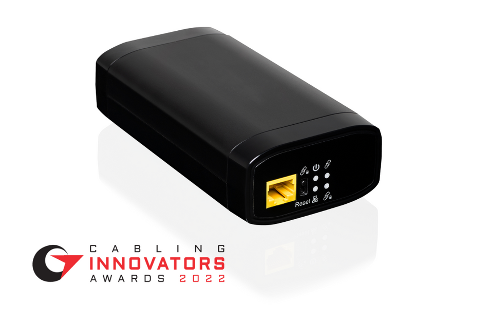 Close-up of the Comtrend GCA-7000 adapter showing the coax connector, Ethernet port, and status LEDs.