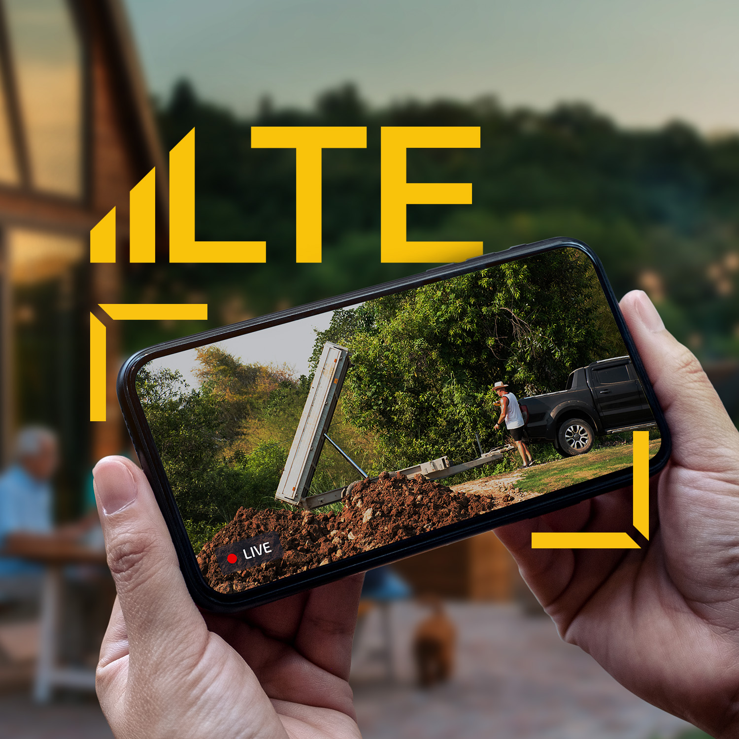 Person holding a smartphone with a video of a truck and person in nature, with 'LTE' branding.